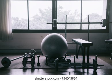 Dumbbell At Home Fitness To Build Muscle,Fitness Club Weight Training Equipment,heavy Weights Barbell On The Floor In GYM.