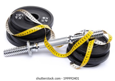 Dumbbell with weights and tape measure, isolated on white