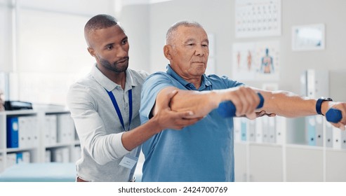 Dumbbells, physical therapy and old man with physiotherapist, muscle training and strength with senior care. Health, wellness and men at physio clinic for weightlifting, rehabilitation and equipment - Powered by Shutterstock