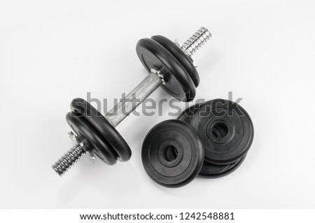 Dumbbells top view on grey background