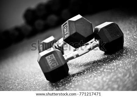  Dumbells on the floor in a gym