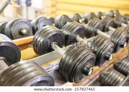 Dumbells in a rack at the gym