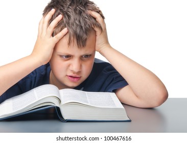 dumbfounded boy with book - Shutterstock ID 100467616