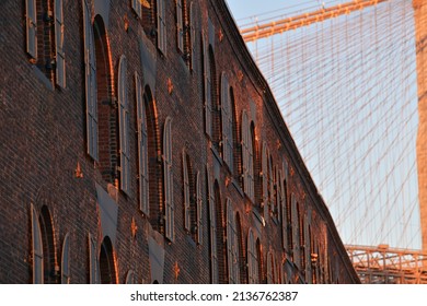 Dumbo Building With West Elm Store And Other Coffee Shops Next To Hudson River Between Manhattan And Brooklyn Bridges. New York, 2021.