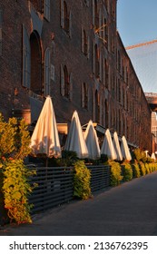 Dumbo Building With West Elm Store And Other Coffee Shops Next To Hudson River Between Manhattan And Brooklyn Bridges. New York, 2021.