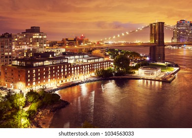 Dumbo Neighborhood And The Brooklyn Bridge At Night, Color Toned Picture, New York City, USA.