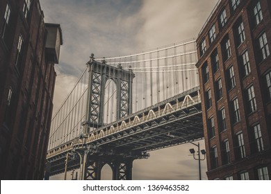 Dumbo View Point Which Can See Manhattan Bridge With Old Brick Building In New York City, USA Downtown Skyline, Architecture And Building With Tourist Concept