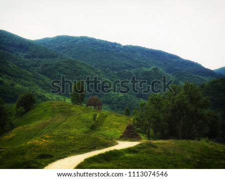Dumesti. Alba. Romania. High mountain old village in Transilvania. Morning landscape on wild mountain hills. Alpine sea.