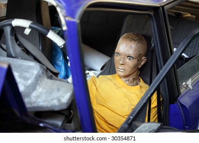 Dummy in the broken car after the test - Shutterstock ID 30354871