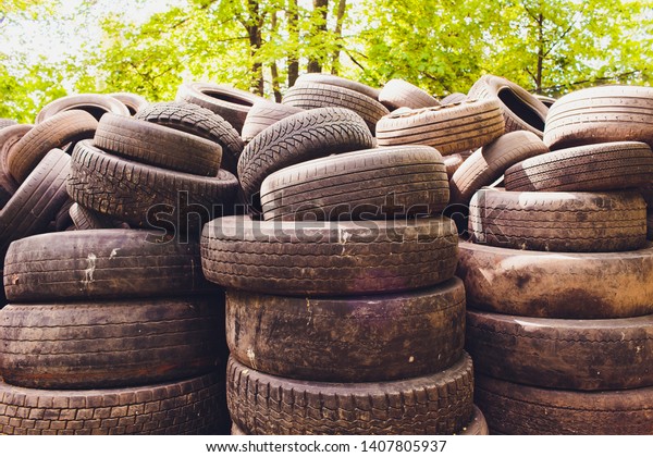 Dump old car\
tires. A whole bunch of car\
wheels.