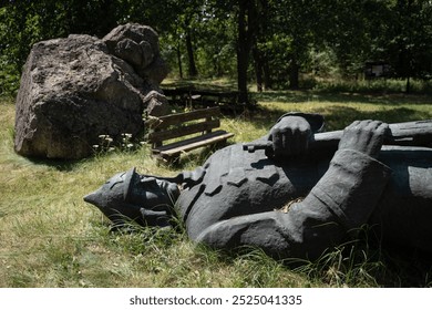 A dump of old decommunized Soviet monuments in a forest near Vinnytsia, Ukraine
