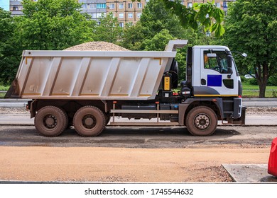 Dump Truck Loaded With Gravel At Road Works