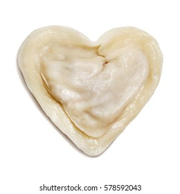 Dumpling in the form of heart on a white background