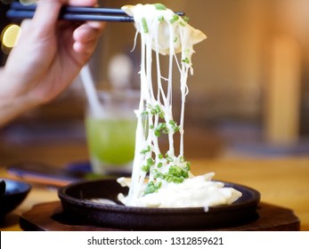 Dumplings baked with cheese - Shutterstock ID 1312859621