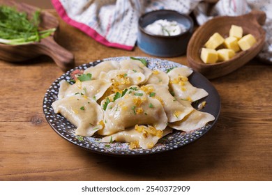 Dumplings filled with ground meat. Varenyky, vareniki, pierogi, pyrohy - dumplings with filling