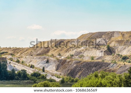 Dumps of processed iron ore. Waste from the iron ore industry. Belgorod region, Russia.