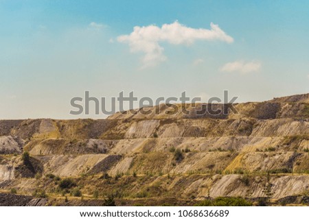 Dumps of processed iron ore. Waste from the iron ore industry. Belgorod region, Russia.