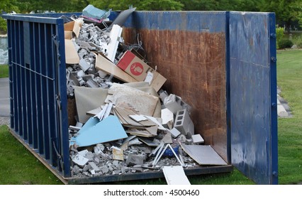 Dumpster With Construction Debris