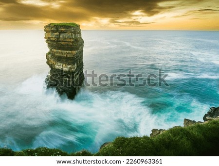 Dun Briste Sea stack Downpatrick Head Wild Atlantic Way Ireland. Beautiful sunset over wild atlantic coast