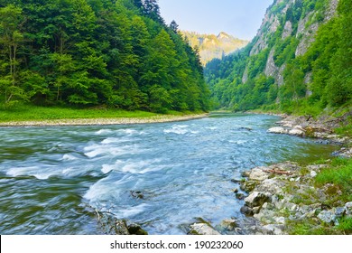 The Dunajec River Gorge. National border between Poland and Slovakia. The Pieniny Mountains Range nature reserve.