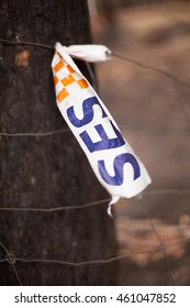 Dunalley, Australia-February 3, 2013. State Emergency Services Tape Attached To A Rural Fence Where A Bushfire Has Destroyed Homes, Dunalley, Tasmania, Australia