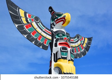 DUNCAN BC CANADA JUNE 22 2015: Totem pole in Duncan's tourism slogan is "The City of Totems". The city has 80 totem poles around the entire town, which were erected in the late 1980s.