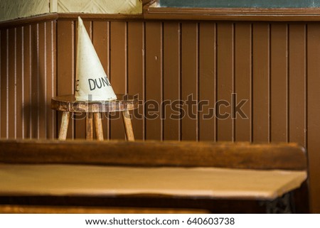 Dunce hat in an old school class.