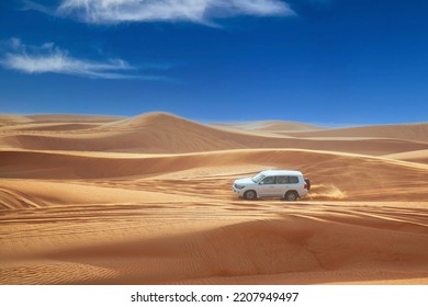 Dune bashing. Desert adventure at its best with four wheel driven cars, some brave drivers, the panoramic views, the scorching sun and the never ending soft, warm, red sand. 