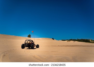 Dune Buggy Driving Through Sand Dunes