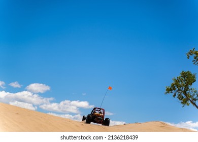 Dune Buggy Driving Through Sand Dunes