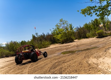 Dune Buggy Driving Through Sand Dunes