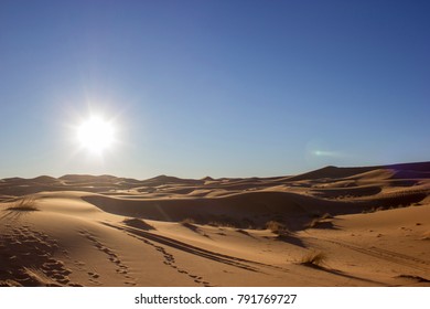 Dune Landscape Of Sahara Desert With Sun