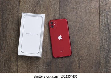 Dunedin, Florida / US .- September 23 2019: New IPhone 11 Product Red Model Smartphone Developed By Apple Top Down View