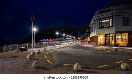 Dunedin, New Zealand - July 29 2022: Car Lights Trails On The Street Of St Clair Beach At Night. 