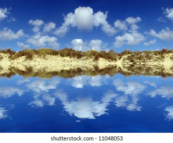 dunes beneath a cloudy sky