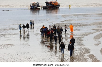 Dungeness, Kent, UK, 29th August 2022, Migrants Arrive On Dungeness Beach After Being Rescued At Sea By A Lifeboat.