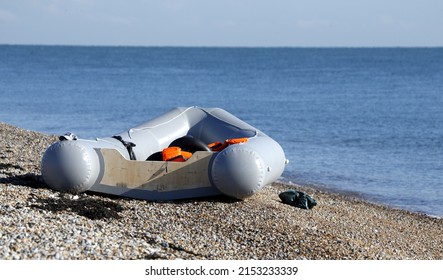 Dungeness, Kent, UK, May 6th 2022, Abandoned Dinghy On The Beach At Dungeness After Migrants Crossed The English Channel To The UK.
