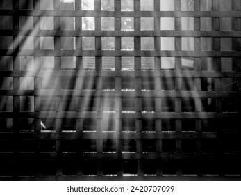 Dungeon concept, metal bars illuminated by sun backlight. Cinematic look. - Powered by Shutterstock