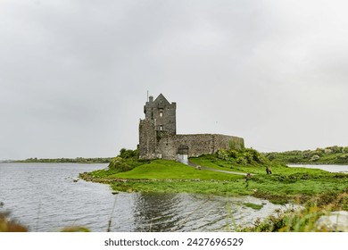 Dunguaire Castle, a 16th-century tower house on the southeastern shore of Galway Bay in County Galway, Ireland, near Kinvara town. - Powered by Shutterstock