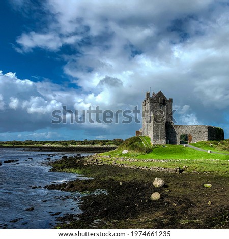 The Dunguaire Castle on the Galway coast, Ireland on a cloudy day