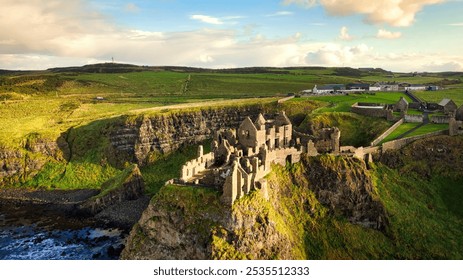 Dunluce Castle in Northern Ireland aerial view - An aerial view capturing the stunning historical ruins, beautifully set against a picturesque coastal landscape - Powered by Shutterstock