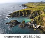 Dunquin Pier in County Kerry in Ireland. Drone point of view. Summer view of Dingle Peninsula. Part of Wild Atlantic Way.