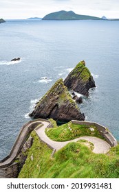 Dunquin Pier on the south end of the Dingle peninsula in Ireland - Shutterstock ID 2019931481