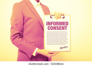 Duo Tone Graphic Of A Woman Showing A Written Informed Consent
