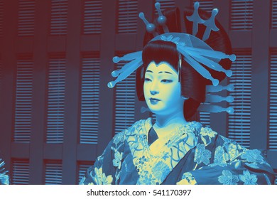 Duo Tone Photo Of Japanese Traditional Doll