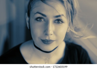 Duo Tone Portrait Of Beautiful Young Woman.