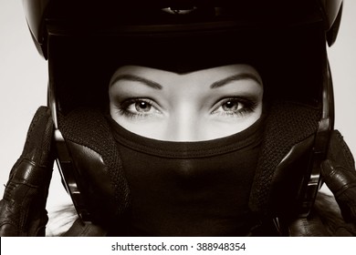 Duotone Close-up Portrait Of Beautiful Woman With Stylish Makeup In Black Biker Helmet, Mask And Gloves