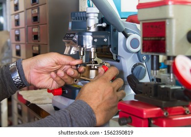 duplicate machine make key. Locksmith theme.  in workshop makes new key