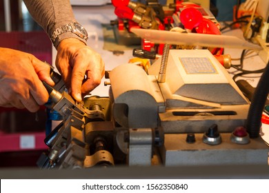 duplicate machine make key. Locksmith theme.  in workshop makes new key