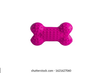 Durable pink rubber dog's bone isolated on white background, puppy dog toy imitated bones for relax. Fetching, tugging, molar tooth cleaning and safety chewing for pup entertained.Close up, copy space